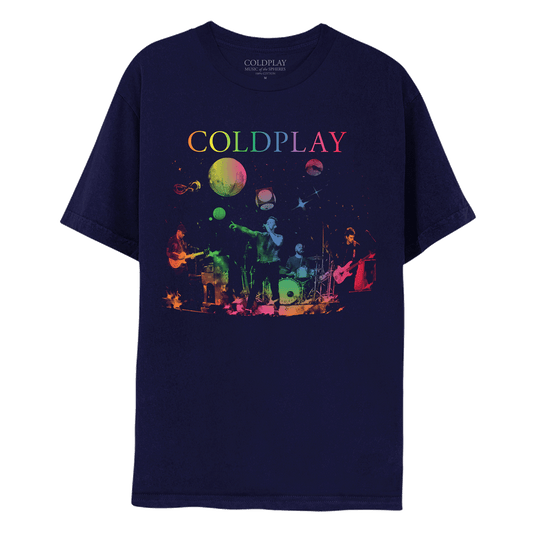 Front: Navy tee, with colorful depiction of the band performing on stage. Chris, in the center, wears a shortsleeve shirt and sings into a mic, in shades of green and blue. Jonny on the left, plays guitar, in red and orange shades. Will is behind the drum set, playing in shades of light blue and green. Guy is on the right playing bass, in pinks and reds. The spheres are above them. COLDPLAY printed across the chest in neon.  